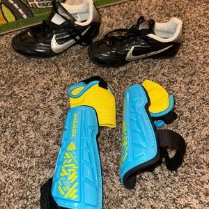 Nike toddler 11c soccer cleats and shin pads